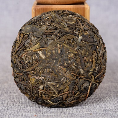 100克犀牛塘 易武古茶树 春茶 云南茶叶普洱生茶 茶饼